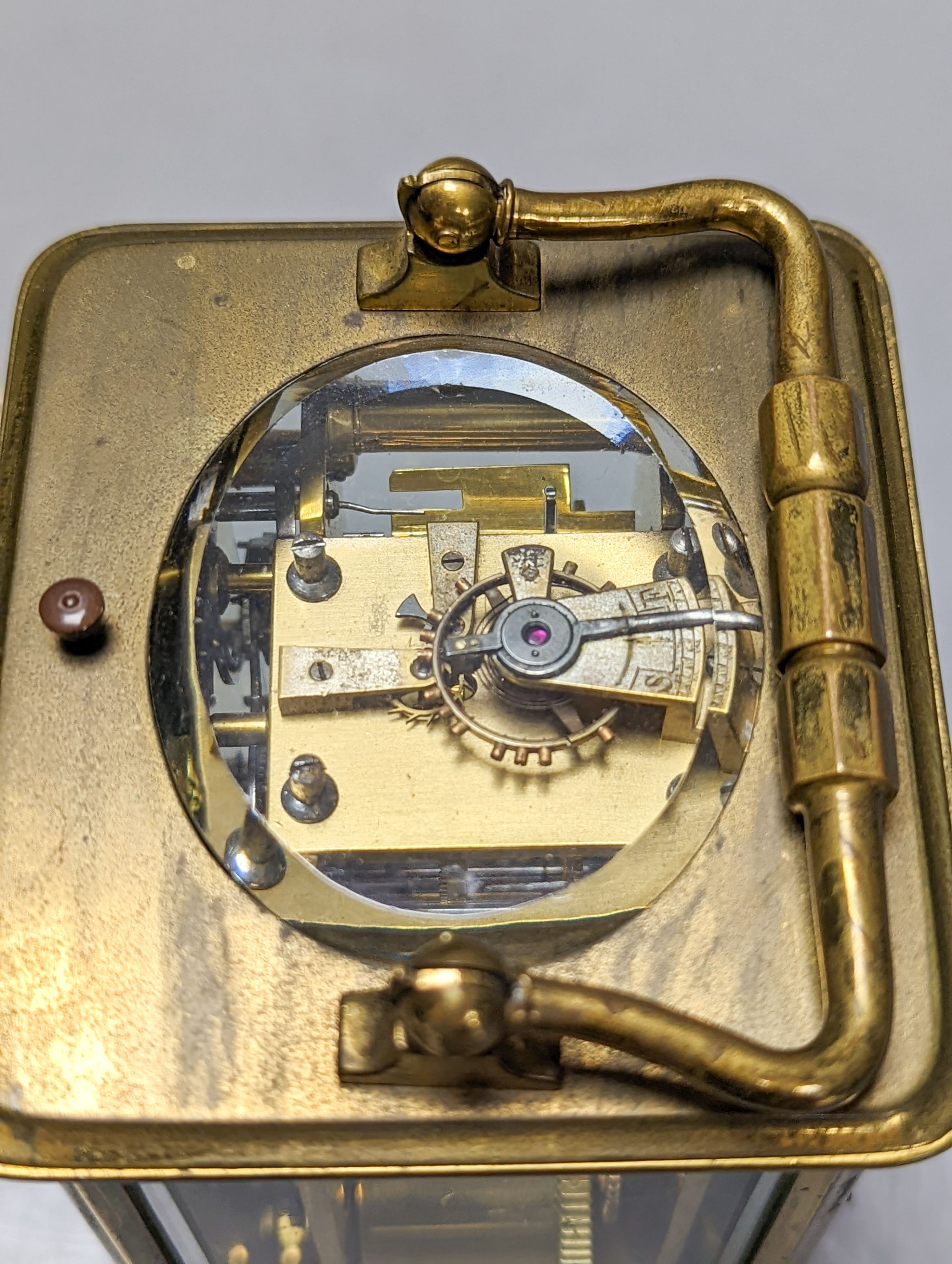 A French brass repeating carriage clock with key. 13.5cm